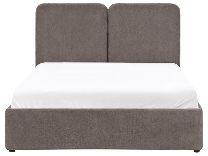 Gray upholstered bed with white mattress 