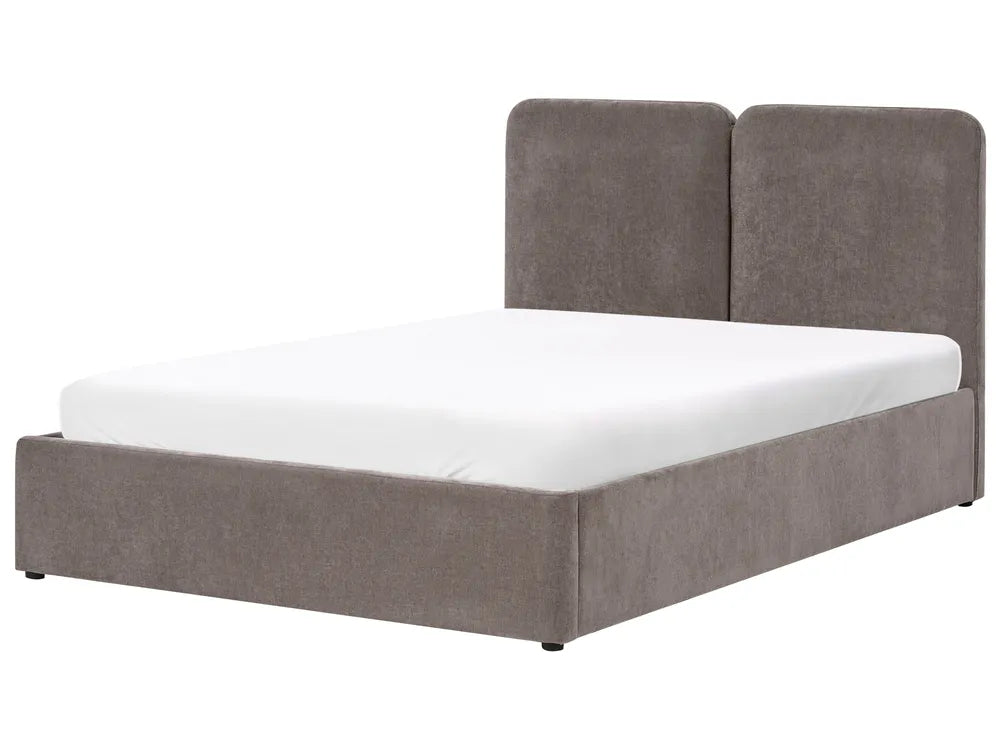 Gray upholstered bed with white mattress 