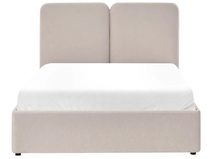 Beige upholstered bed with white mattress 