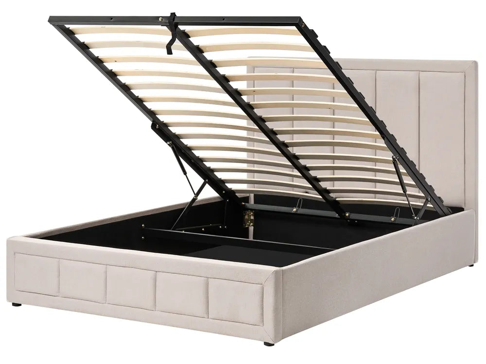 Beige bed frame with open storage compartment on a white background