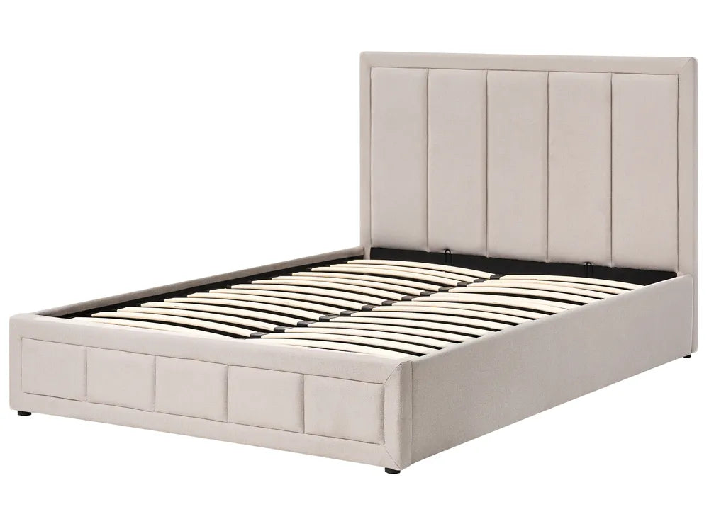Beige upholstered bed frame on a white background
