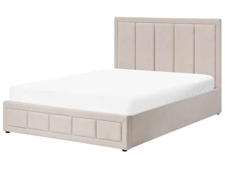 Beige upholstered bed with white mattress on a white background
