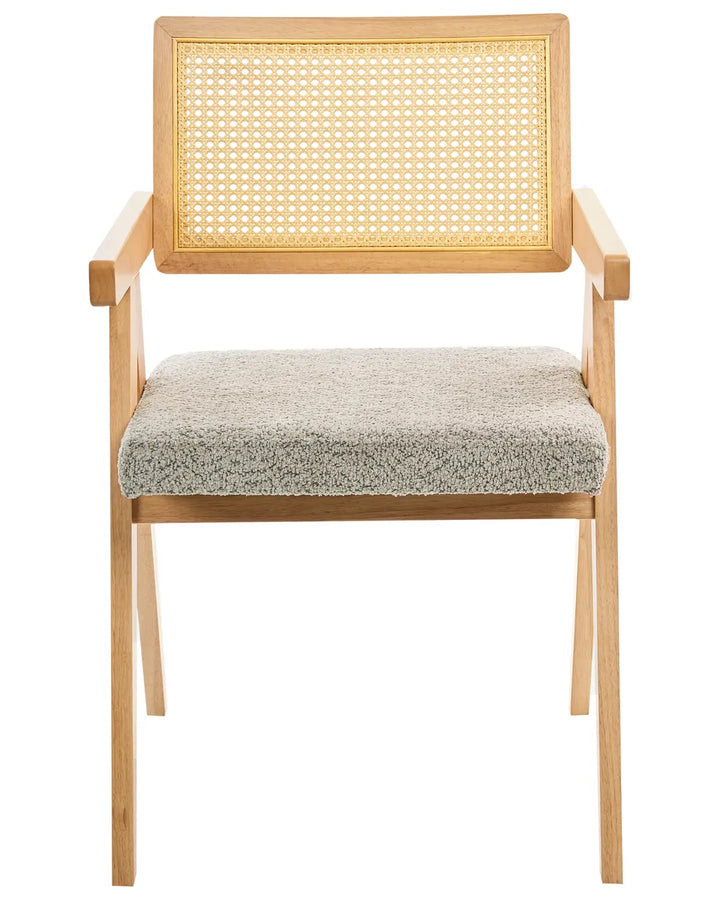 Light wood dining chair with woven cane backrest and grey boucle upholstered seat on a white background.