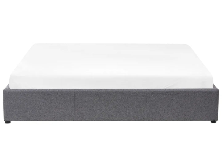 Grey bed frame with white mattress 
