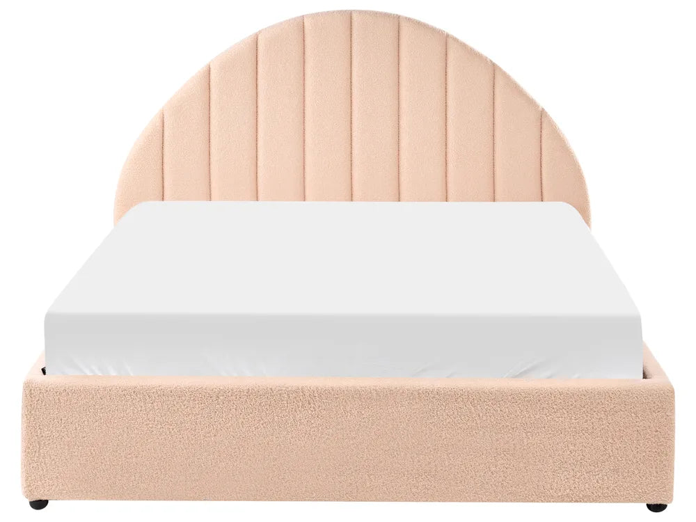 Beige upholstered bed with a white mattress on a white background