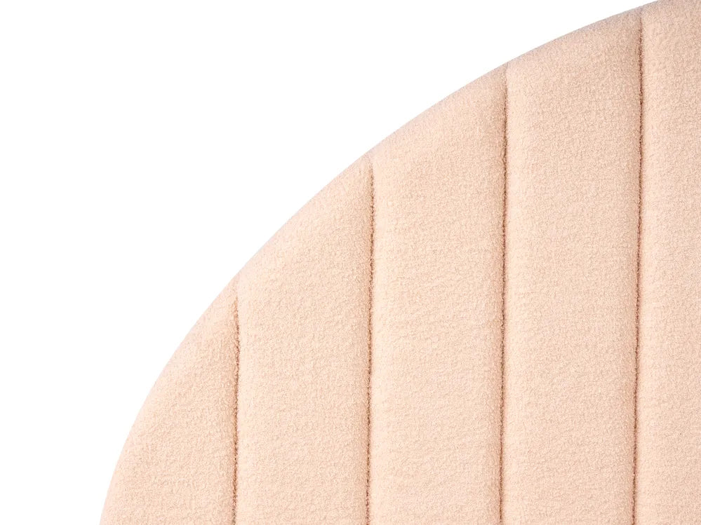 Close-up of a beige quilted fabric surface