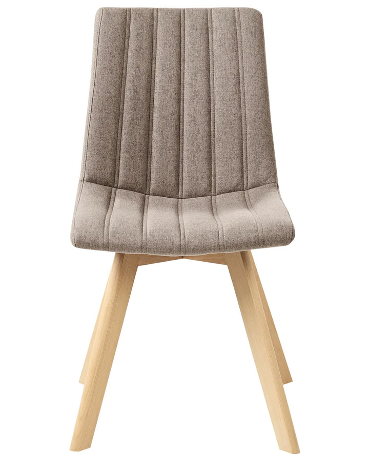 Fabric dining chair with vertical channel stitching, a high backrest, and natural wood legs.