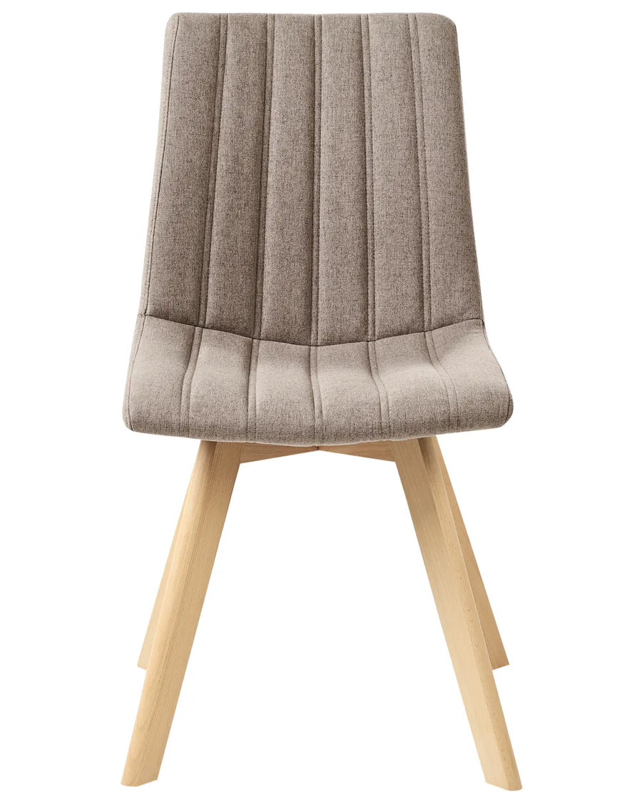 Fabric dining chair with vertical channel stitching, a high backrest, and natural wood legs.