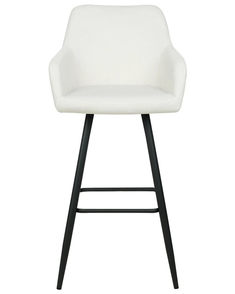 Off-white velvet bar chair with a rounded upholstered backrest, padded seat with integrated armrests, and slanted black metal legs.
