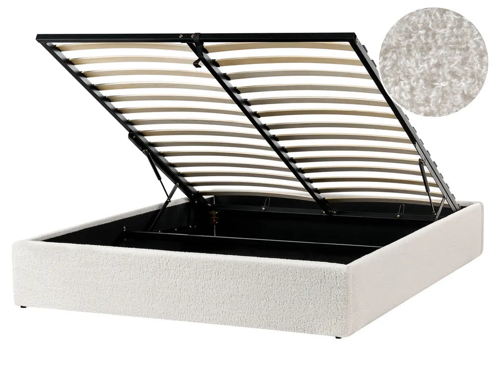 White upholstered bed frame with open headboard showing wooden slats on a white background.