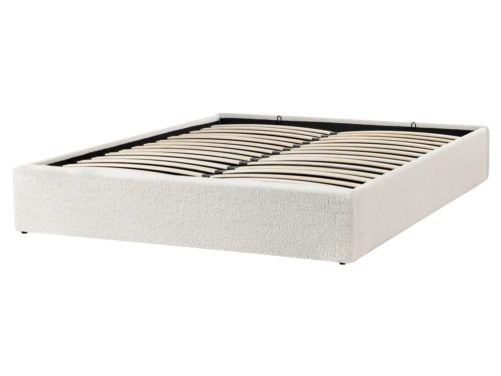 White upholstered bed frame with wooden slats on a white background