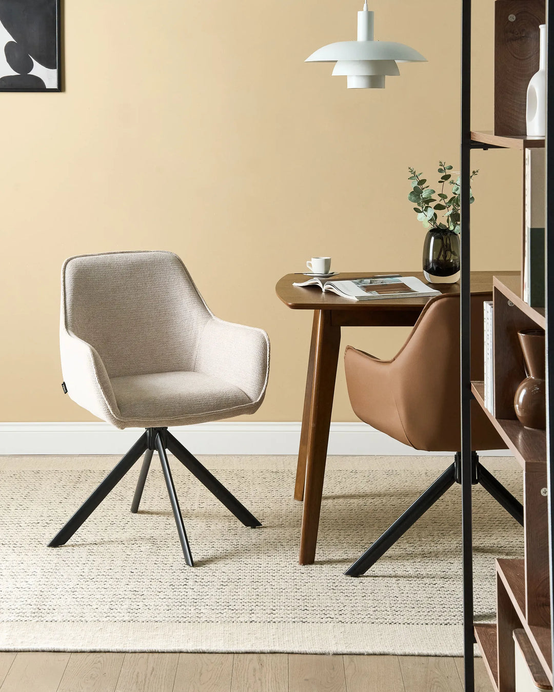 Modern dining space featuring a beige swivel dining chair paired with a wooden dining table, neutral-toned rug, warm beige walls, and contemporary décor for a cozy, sophisticated look.