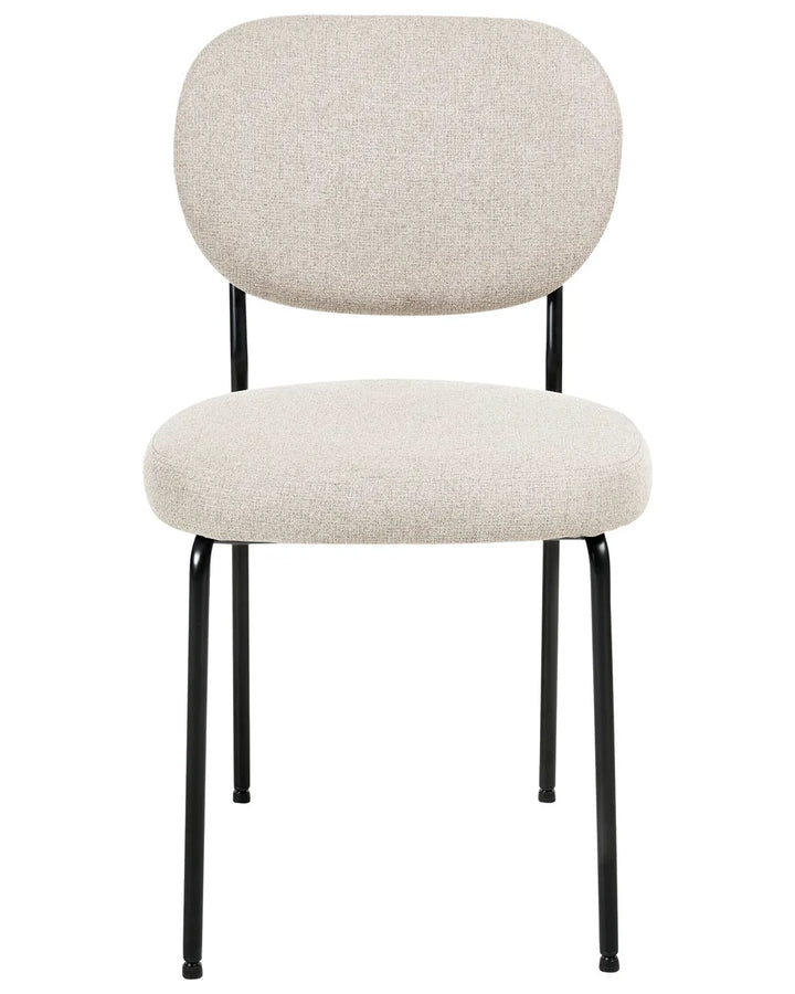Beige upholstered dining chair with a rounded backrest, generously padded seat, and slim black metal frame, offering comfort with a clean, modern design.