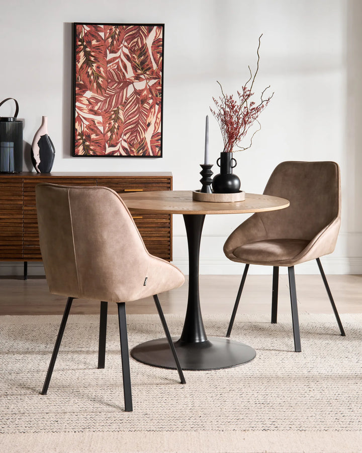 Taupe dining chair styled around a modern dining table in a warm contemporary interior.