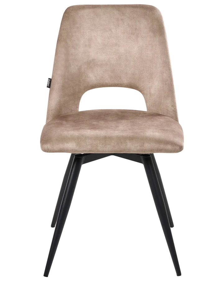 Taupe velvet dining chair with a curved cutout backrest and black metal legs.
