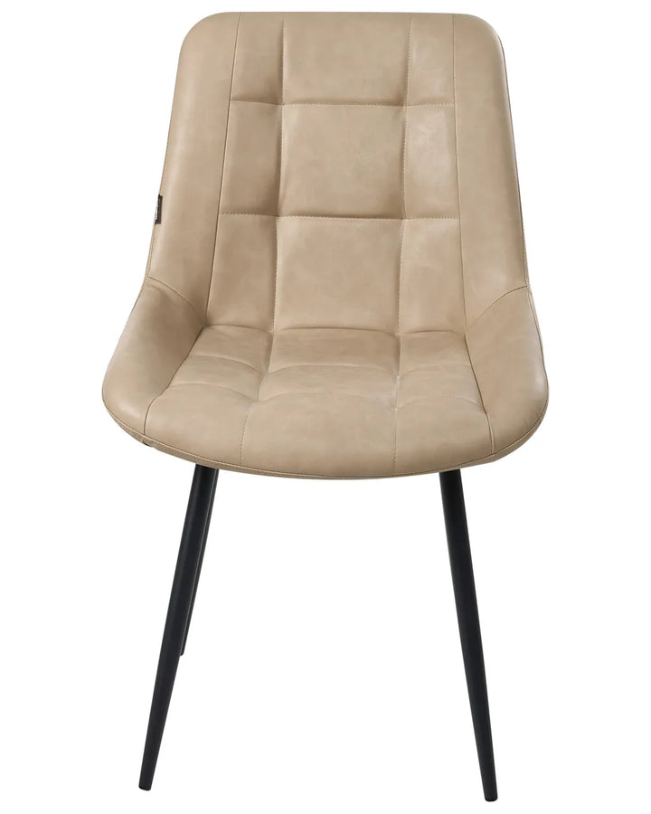 Beige faux leather dining chair with a cushioned quilted backrest, curved seat, and black metal legs on a white background.