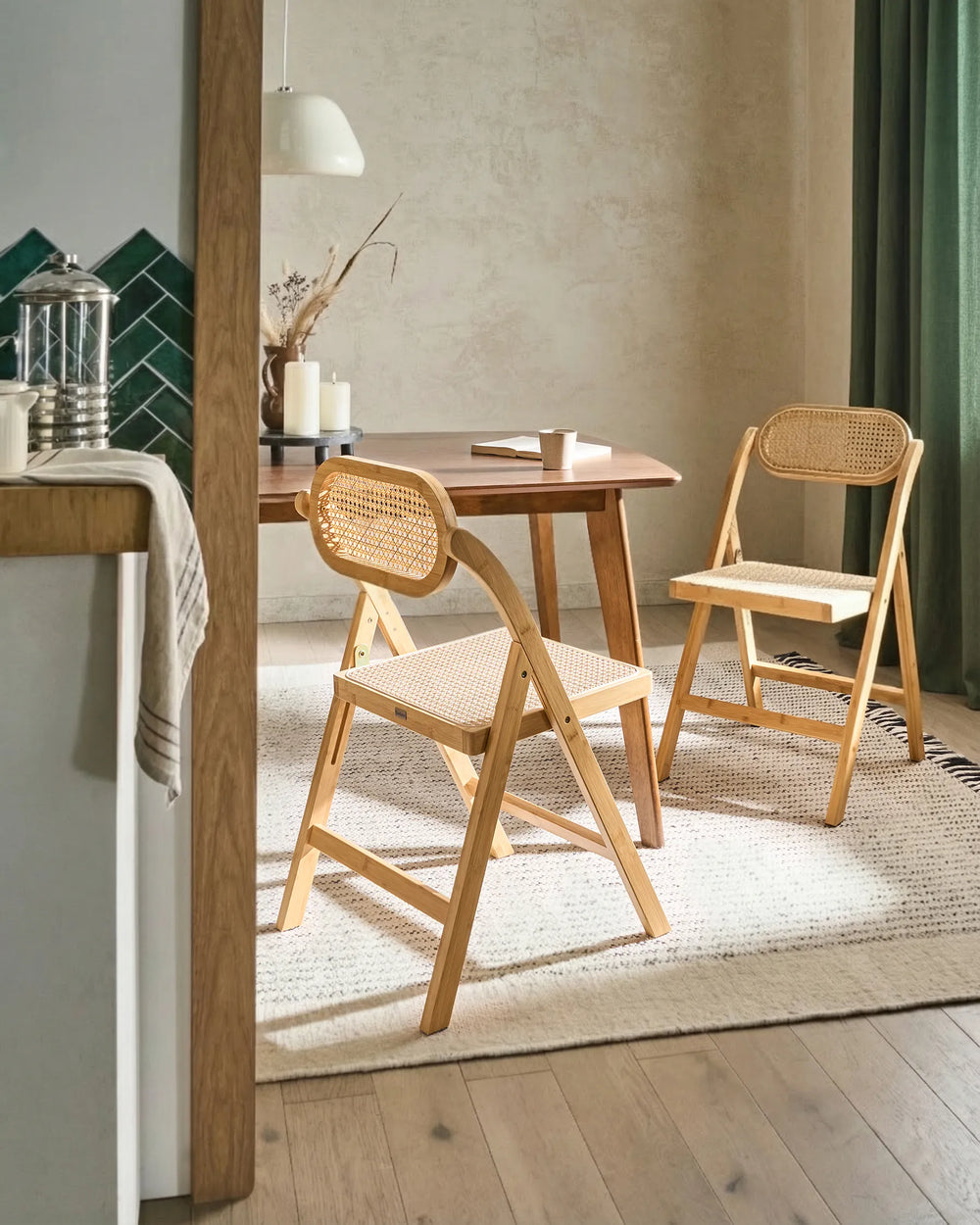 Styled within a warm, relaxed dining setting, this bamboo folding chair brings effortless natural charm to the space. The woven cane accents and light wood finish complement coastal, bohemian, Scandinavian, and Japandi interiors, while the foldable construction makes it ideal for flexible dining arrangements, compact living spaces, and occasional guest seating.