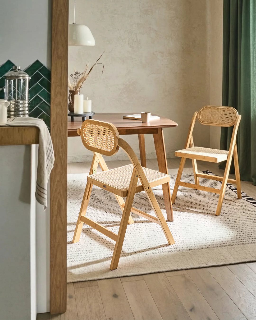 Styled within a warm, relaxed dining setting, this bamboo folding chair brings effortless natural charm to the space. The woven cane accents and light wood finish complement coastal, bohemian, Scandinavian, and Japandi interiors, while the foldable construction makes it ideal for flexible dining arrangements, compact living spaces, and occasional guest seating.