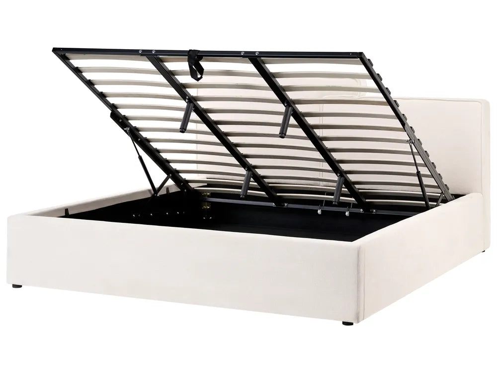 White bed frame with black metal headboard on a white background