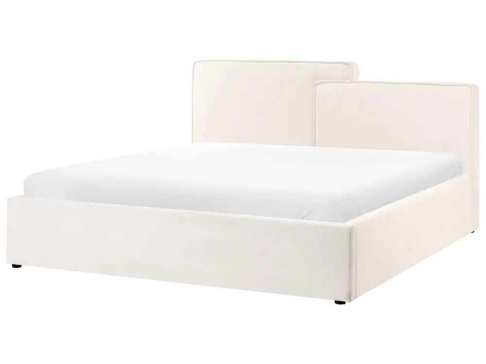 White bed frame with mattress on a white background