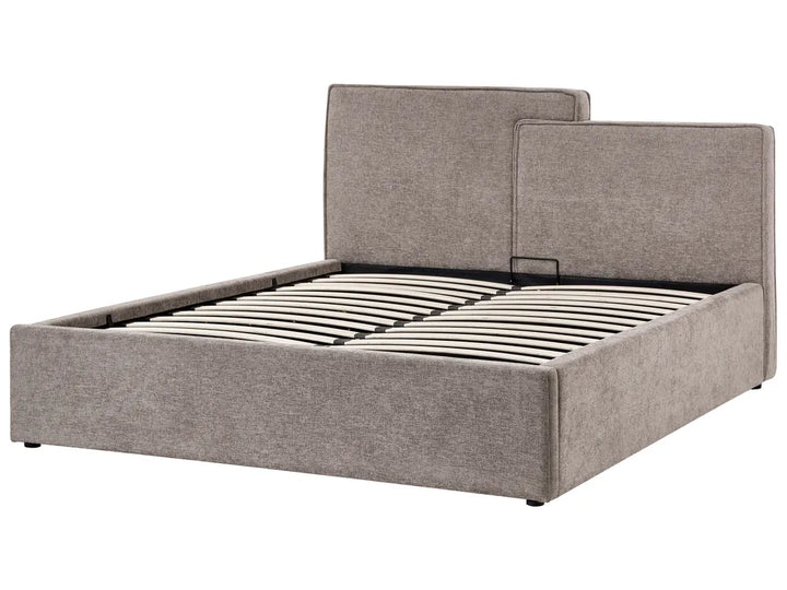 Gray upholstered bed frame on a white background