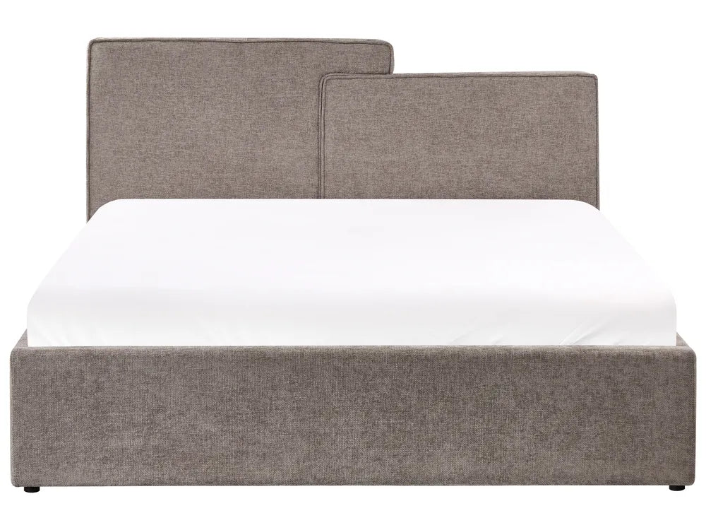 Gray upholstered bed with white mattress on a white background