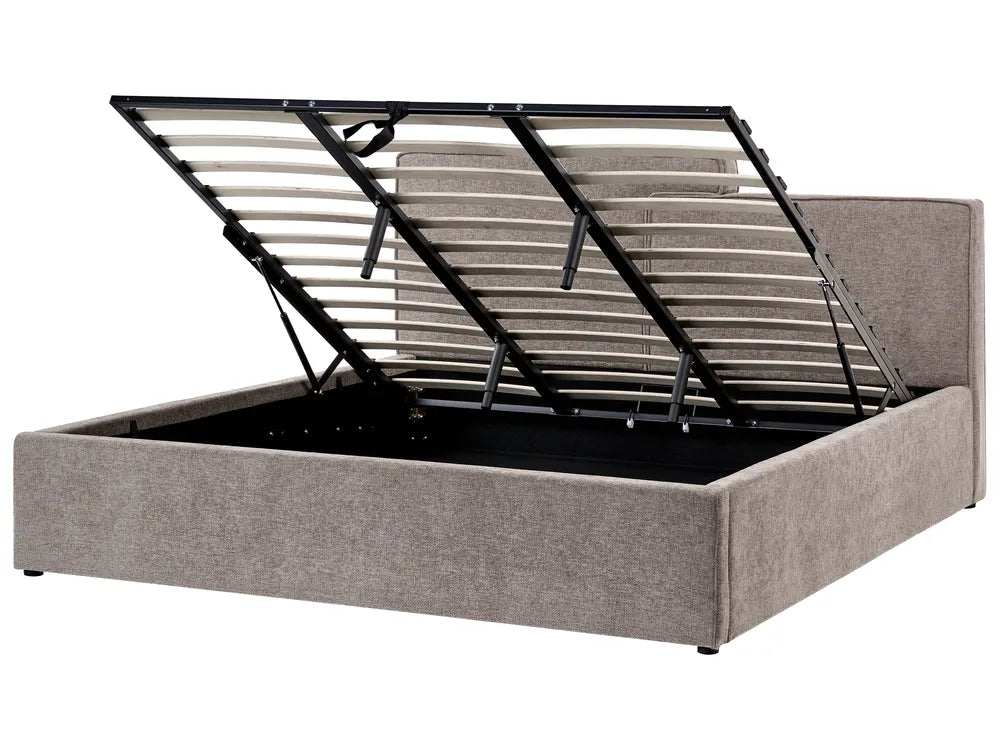 Gray upholstered bed frame with metal slat support on a white background