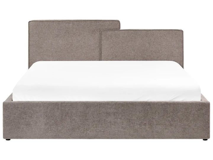 Gray upholstered bed with white mattress on a white background