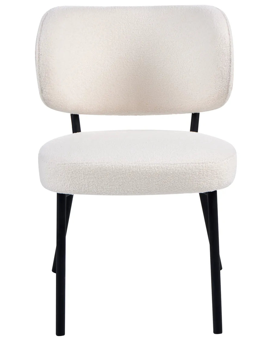 Modern dining chair upholstered in soft off-white boucle fabric, featuring a curved backrest, padded seat, and sleek black metal legs.