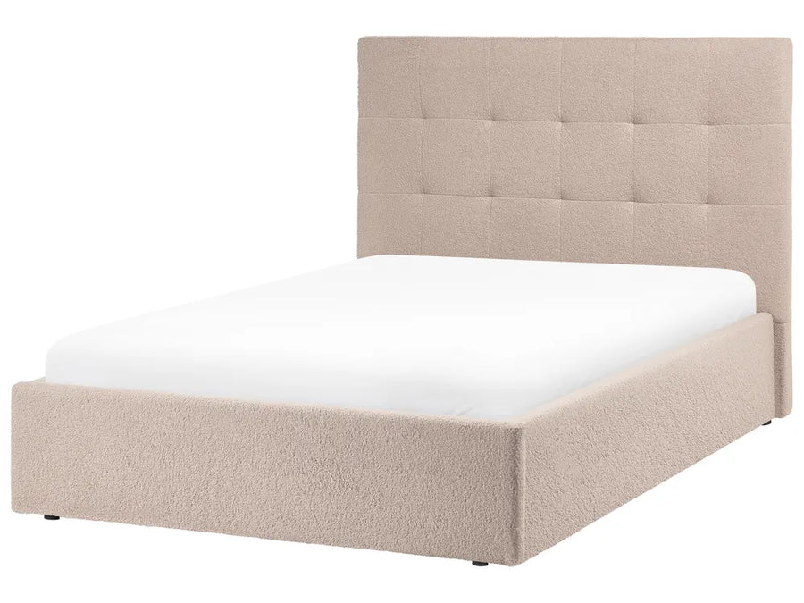 Beige upholstered bed with white mattress 