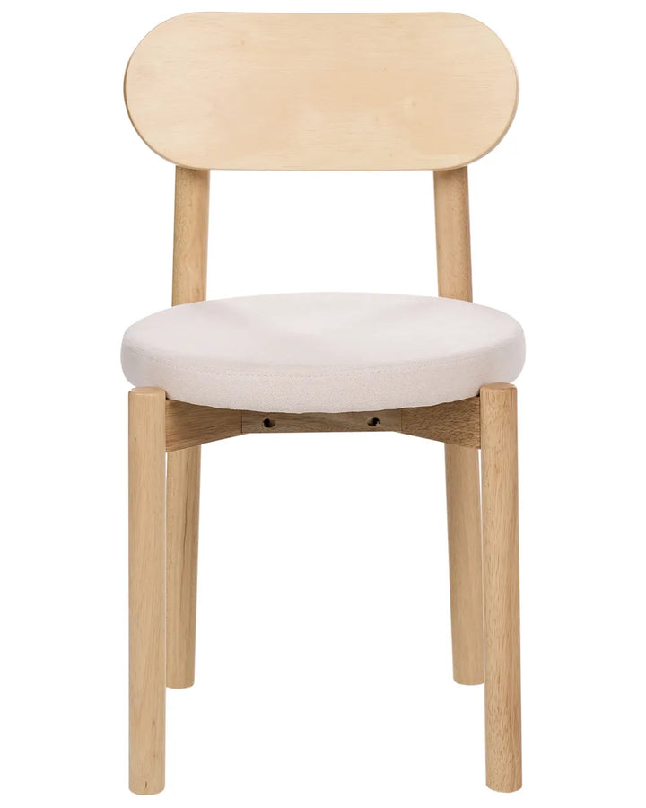 Light oak dining chair with a rounded upholstered seat, smooth curved backrest, and clean minimalist silhouette, offering a soft Scandinavian-inspired aesthetic with everyday comfort.