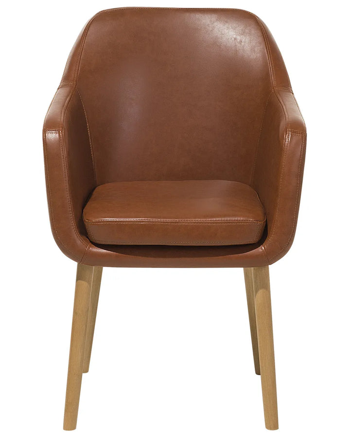 Brown faux leather dining chair with a curved tub-style backrest, padded seat cushion, and natural wood legs, offering comfort with timeless elegance.