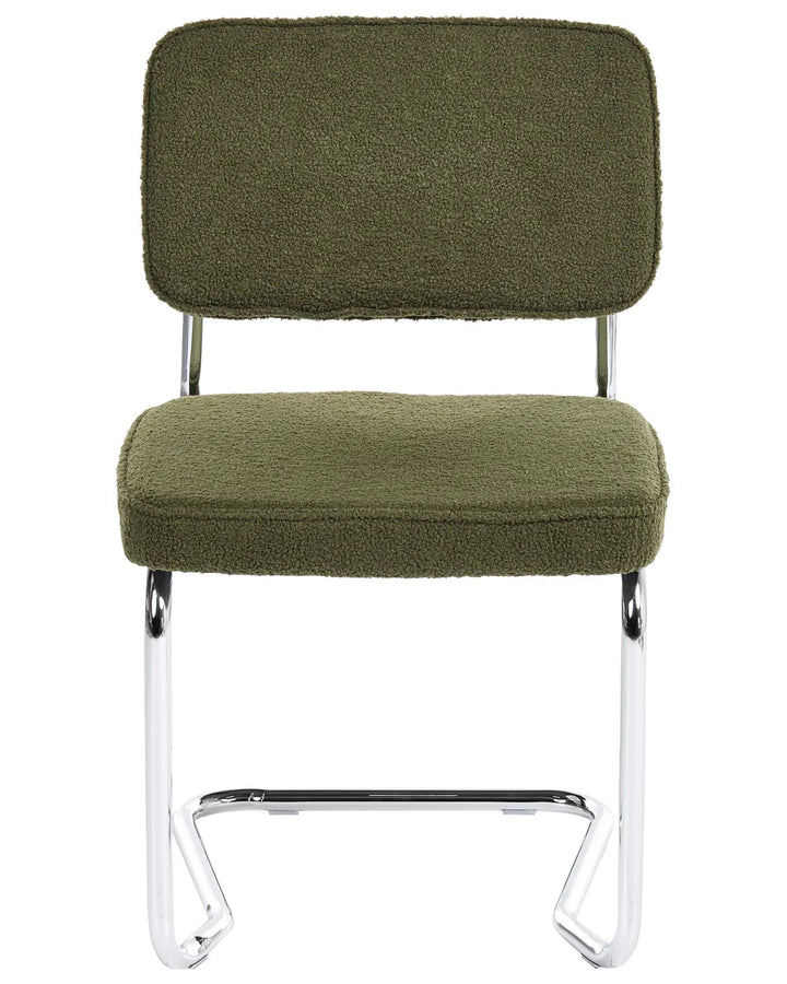 Green bouclé cantilever dining chair without armrests, with an upholstered seat and backrest, on a silver-tone metal frame.