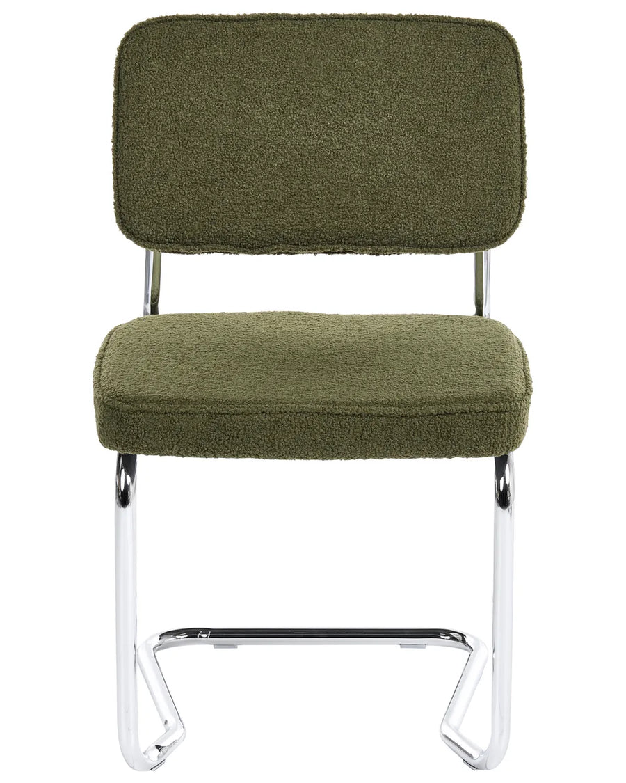 Green bouclé cantilever dining chair without armrests, with an upholstered seat and backrest, on a silver-tone metal frame.