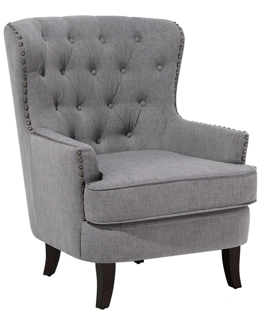 Gray upholstered chair with buttoned backrest and nailhead trim on a white background