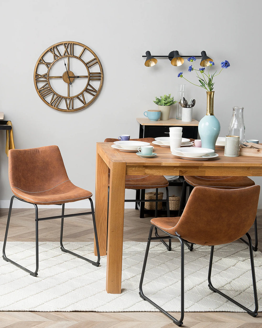 Contemporary dining space featuring warm brown dining chairs paired with natural wood furniture, adding character and casual elegance to everyday meals.