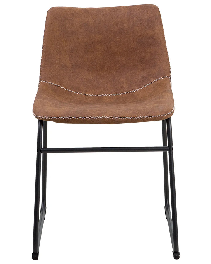 Industrial-style dining chair with brown faux leather upholstery, decorative stitching, and a sleek black sled base for a modern loft-inspired look.
