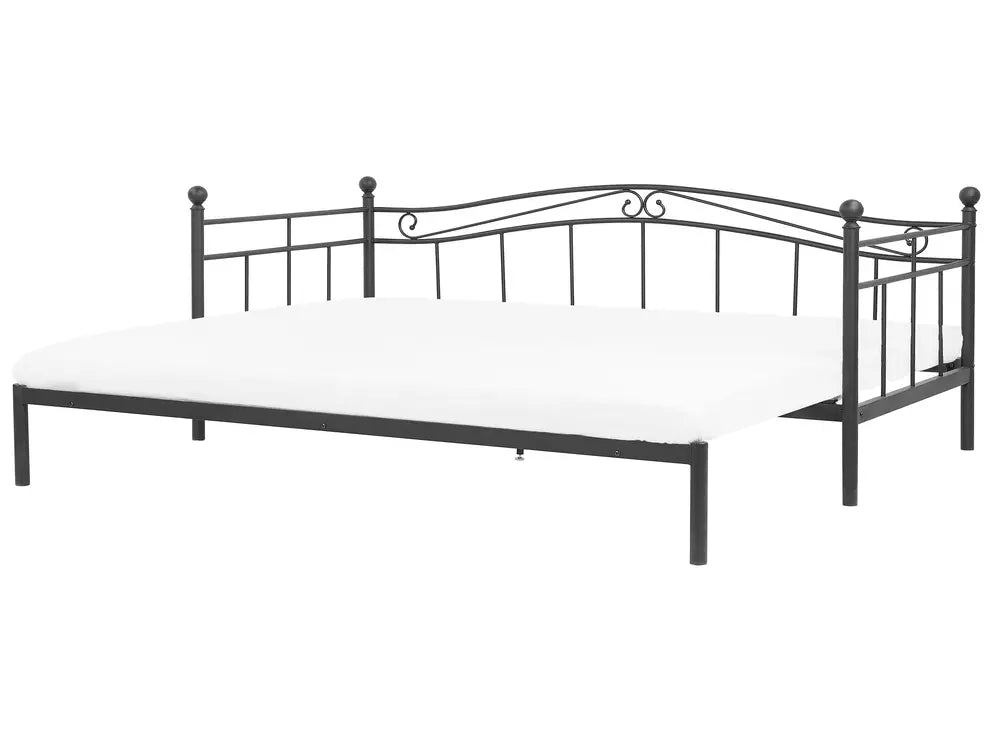 Black metal bed frame on a white background