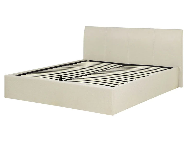 Beige bed frame with black metal bars 