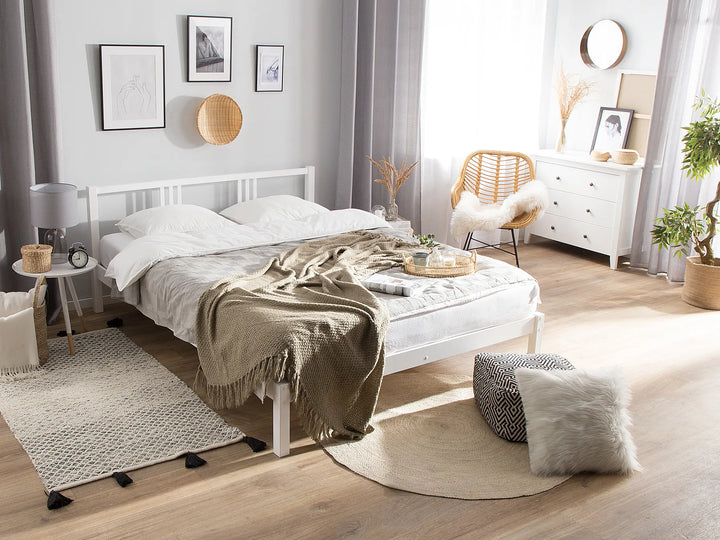 White pine wood bed frame with a simple design