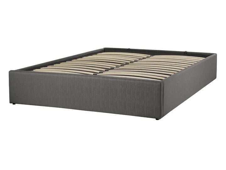 Gray upholstered bed frame on a white background