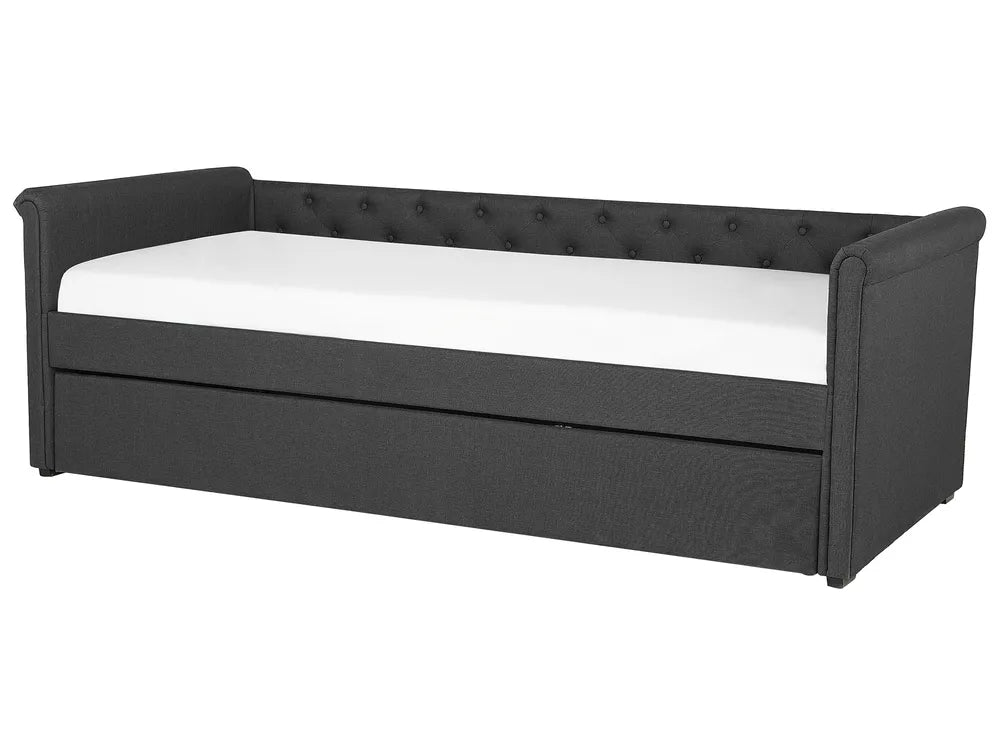 Black upholstered daybed with white mattress on a white background