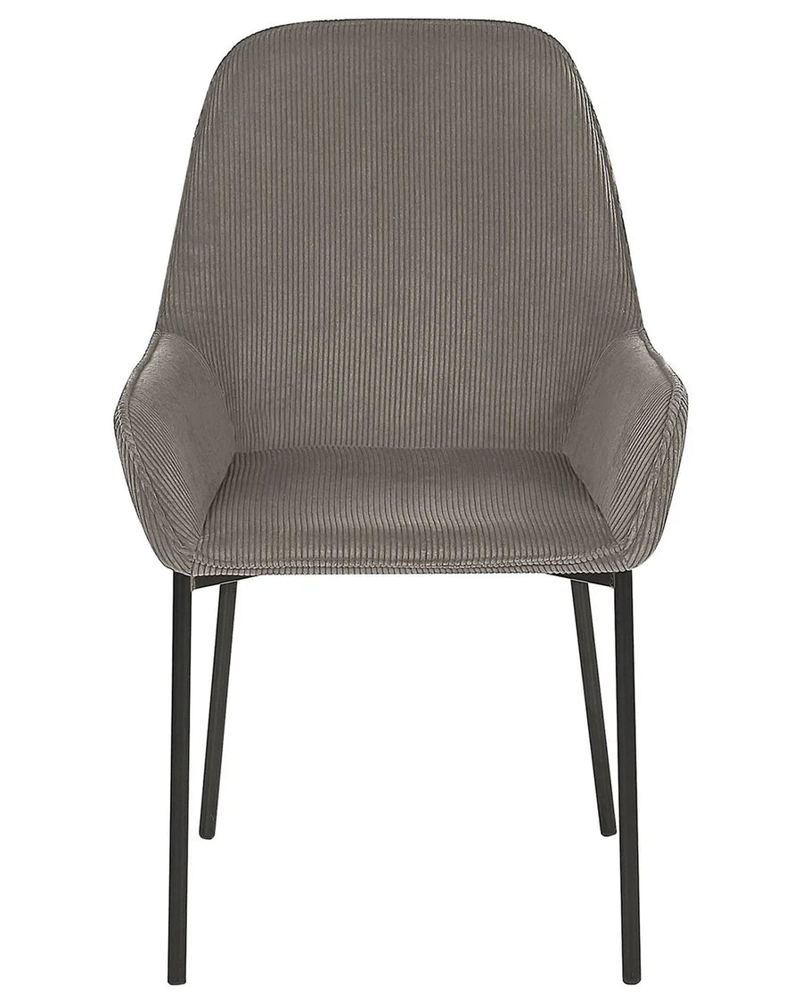 Corduroy dining chair with integrated armrests, a cushioned seat, and slim black metal legs, combining comfort with contemporary style.