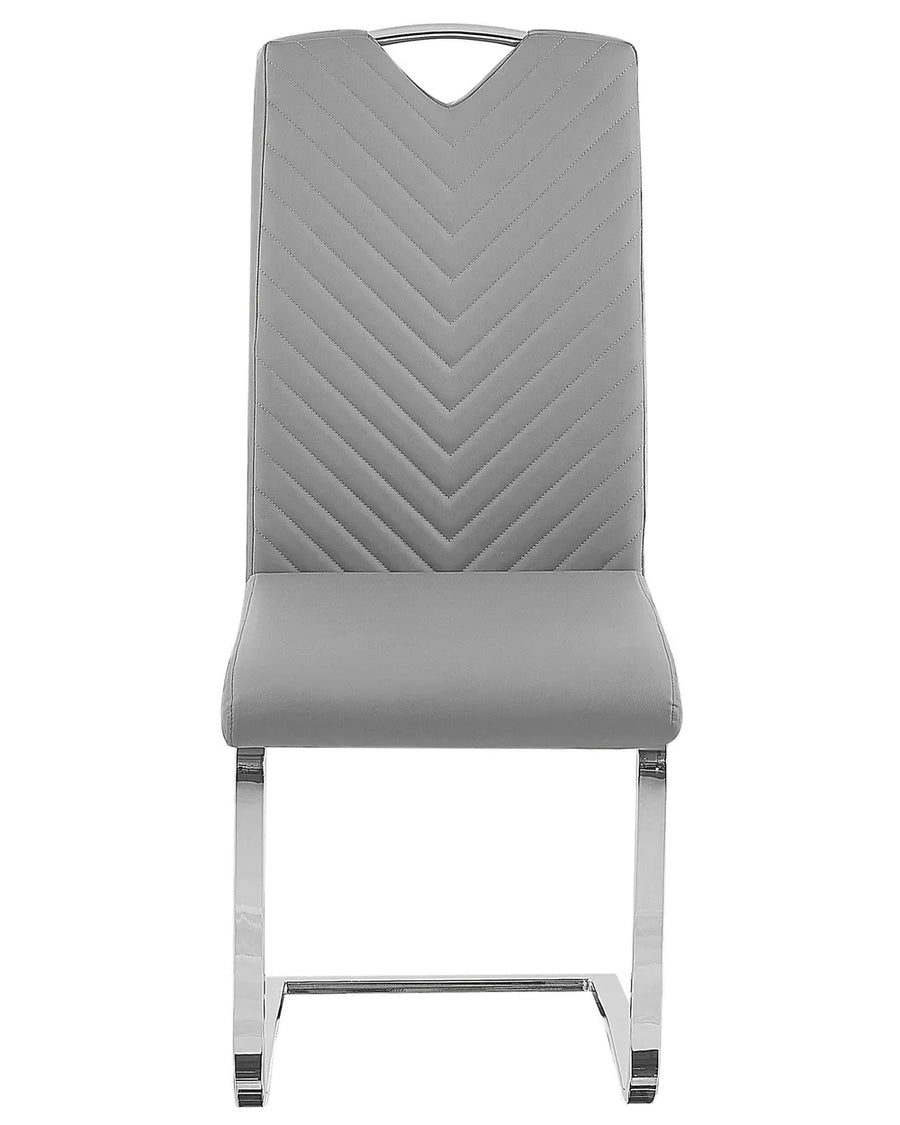 Light grey faux leather cantilever dining chair with chevron stitching, chrome handle, and polished chrome sled base on a white background.
