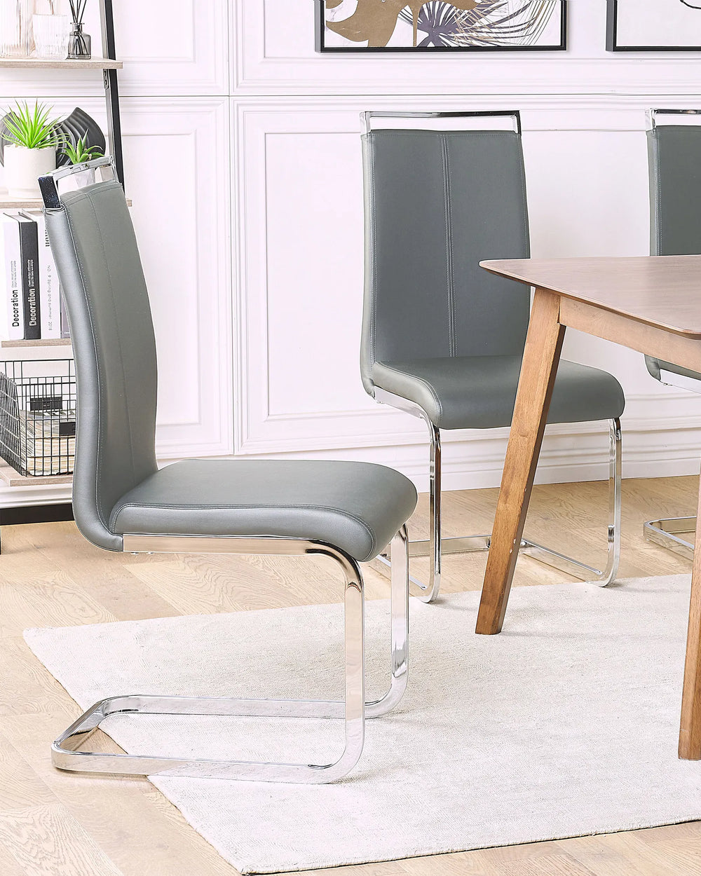 Styled around a wooden dining table, these elegant grey dining chairs bring a refined contemporary feel while providing comfortable seating for everyday dining and entertaining.