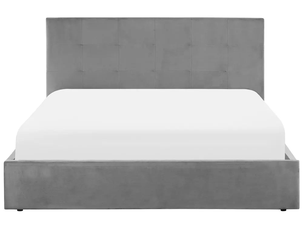 Grey upholstered bed with white mattress on a white background