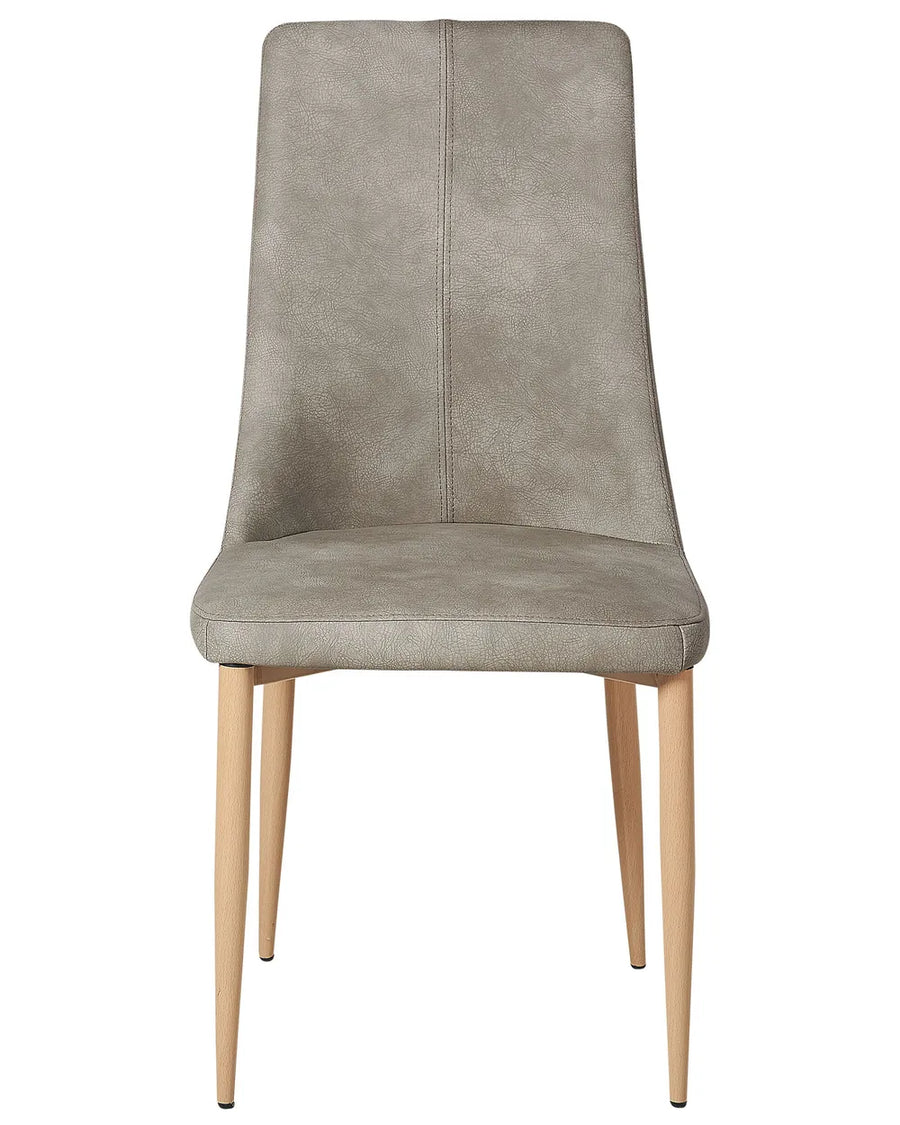 Elegant dining chair upholstered in light grey faux leather with a subtly distressed finish, featuring a high supportive backrest and tapered natural wood-effect legs. Its clean silhouette and soft padding offer both comfort and contemporary style.
