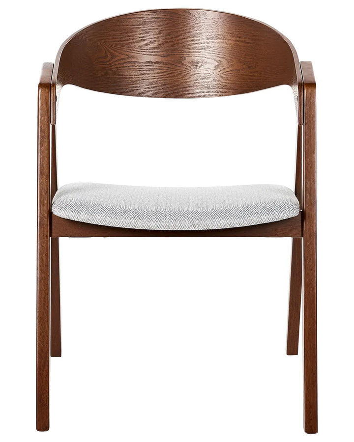 Dark wood dining chair with curved backrest and light grey upholstered seat on a white background.