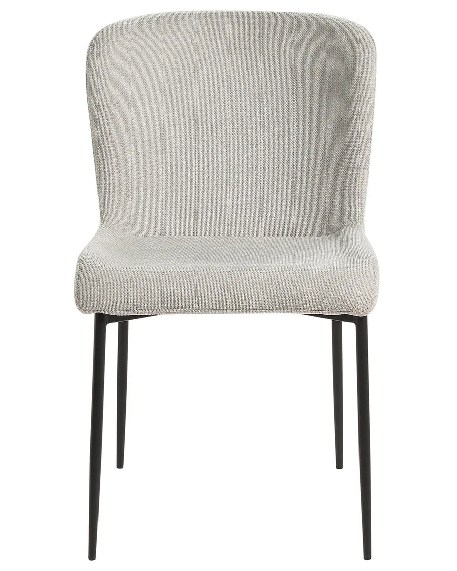 Light grey upholstered dining chair featuring a curved backrest, cushioned seat, and slim black metal legs. Its clean silhouette and textured fabric create a contemporary, minimalist look suitable for dining spaces and modern interiors.