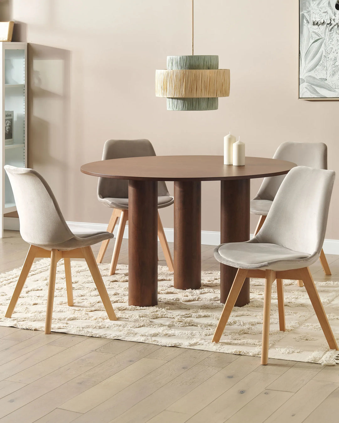 Elegant dining setting featuring grey velvet chairs, warm wood tones, and a calming neutral palette.